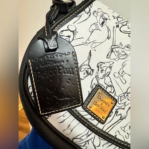 Like New! Dooney and Bourke Disney Tinker Bell Peter Pan crossbody purse NWO.